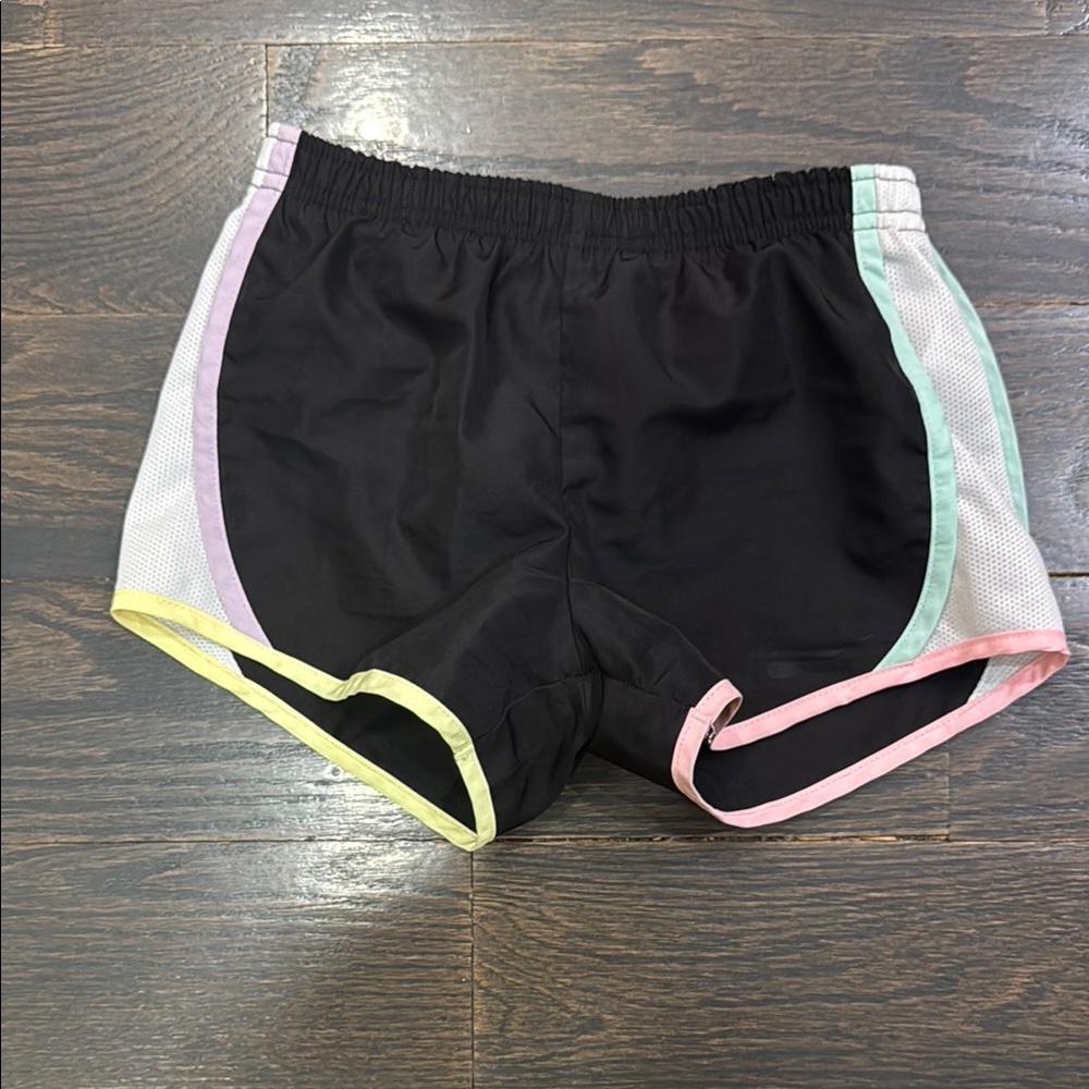 Nike Black and Pink Athletic Shorts with Curved Hem